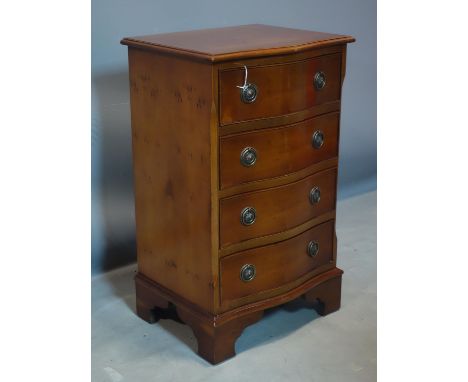 A Georgian style yew wood serpentine front side chest of drawers, raised on bracket feet, H.75 W.46 D.37cm 