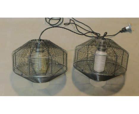 A pair of industrial style wire mesh ceiling light pendants, H.23 D.27cm 
