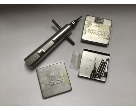 A small collection of assorted Rolex watch tools including splines etc. All with Rolex branding 