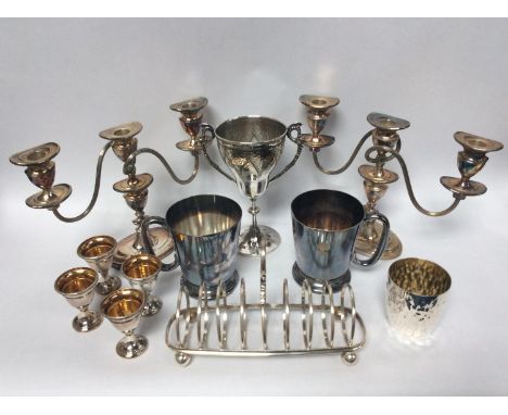 Various silver-plate including a pair of Mappin &amp; Webb tankards and trophy cup, Hukin &amp; Heath textured beaker in the 