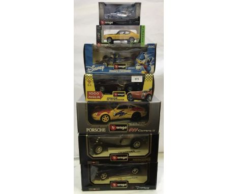 7 boxed Burago die cast model cars including 3 x scale 1:18 Dodge Viper GTS Coupe, Porsche 911 Carrera GT, Mercedes Benz 500k