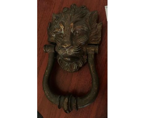 A heavy cast brass Lion's mask door knocker, 24cm 