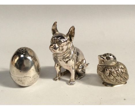 A .925 standard hollow-cast figure of a seated French Bulldog, together with A Victorian silver egg-shaped pepper caster  and