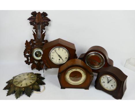 A group of mantel clocks to include a bakelite cased Smiths example, a Metamec wall clock and a barometer. [W]