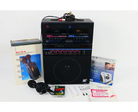A vintage Realistic Twin Cassette Karaoke System, contained in shipping box, a boxed Alba Twin Microphone Karaoke system, als
