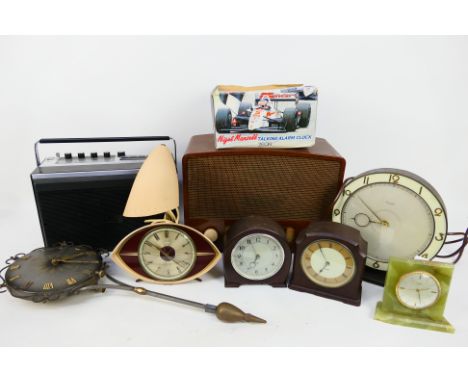 Vintage radios to include a Sanyo M4400F radio cassette recorder and a quantity of clocks to include Smiths, Kienzle and simi