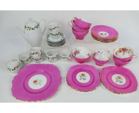 A part tea service with floral decoration and a coffee service. [W]