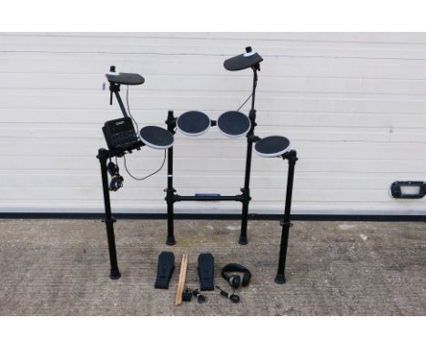 ION - Electronic Drum Set. An unboxed ION Electronic Drum Set by Redline Drums. The set comes rack mounted with separate Hi-h