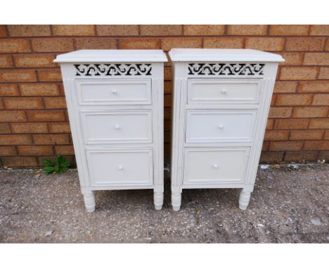 A pair of white vintage style wooden bedside cabinets, size 57 x 37 x 28 cm