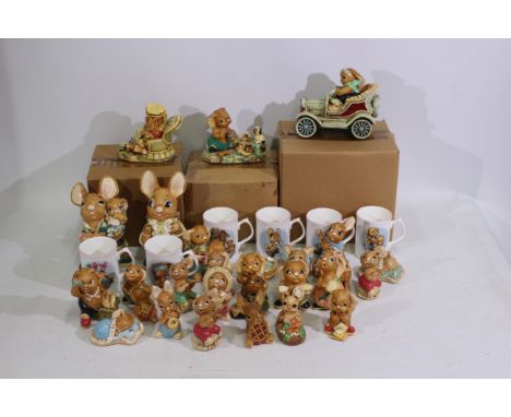 Pendelfin - A collection of mostly boxed Pendelfin figurines - Lot includes 6 x ceramic Pendelfin cups. A 'Father Rabbit' fig