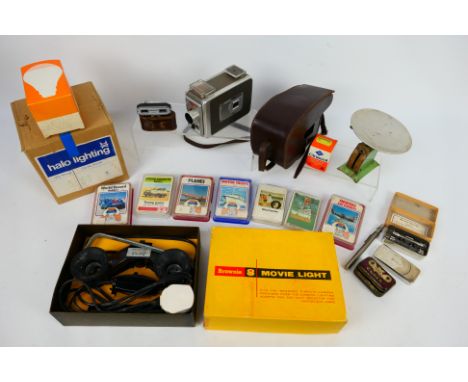Lot comprising a Kodak Brownie 8mm Movie Camera II, a boxed Brownie 8 Movie Light, vintage Top Trumps cards to include World 