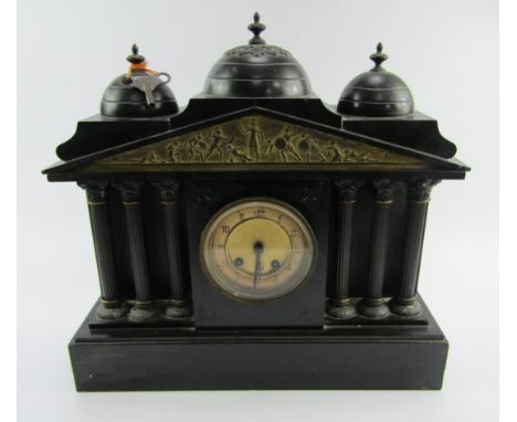 A Victorian slate architectural mantel clock, of Greek temple form, brass dial with enamel chapter ring bearing Arabic numera