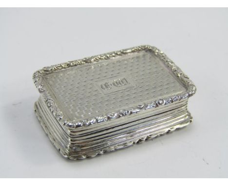 A William IV silver vinaigrette, with engine turned decoration and foliate border, gilt interior, Birmingham 1836, Joseph Wil