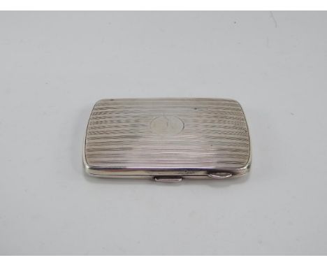 A George VI silver cigarette case, with engine turned decoration, Birmingham 1945, 2.6toz.
