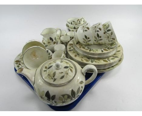 A Wedgwood porcelain breakfast service, decorated in the Beaconsfield pattern, comprising teapot, cream jug, two sugar bowls,