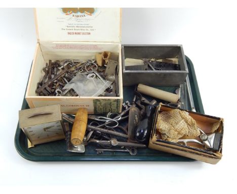 Barber's clippers, scissors, Smiths clock, corkscrew, door and furniture keys.