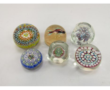 A Chinese fish paperweight, Murano glass millefiori paperweight, faceted millefiori and opaque spiral twist ring paperweight,