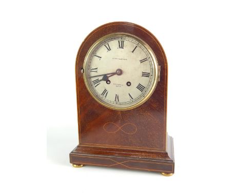 An Edwardian mahogany and boxwood line inlaid mantel clock, Barron Clark & Co, Peterboro & Boston, circular silvered dial bea