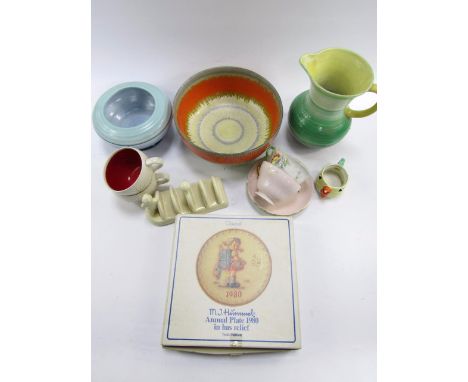 A Shelley early 20thC slipware fruit bowl, banded vase and a water jug, two Shelley porcelain tea cups and saucers, Goebel 19