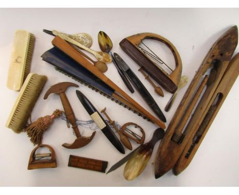 A group of weaving implements, pair of Victorian crested ivory backed clothes brushes, horn spoons, Chinese paper fans and a 