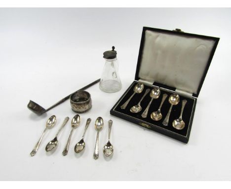 A set of six silver coffee spoons, Sheffield 1959, George VI cut glass oil jar with a silver hinged lid, silver napkin ring, 