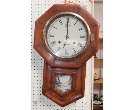 A Smiths oak cased drop dial wall clock, enamel dial bearing Roman numerals, eight day movement, octagonal cased, 49cm long.