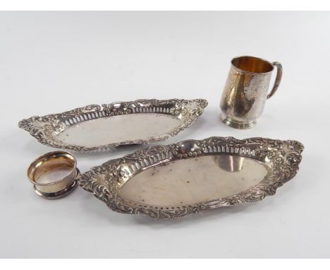 A pair of George V silver oval dishes, with pierced and rococo embossed floral and foliate decorated, Birmingham 1924, silver