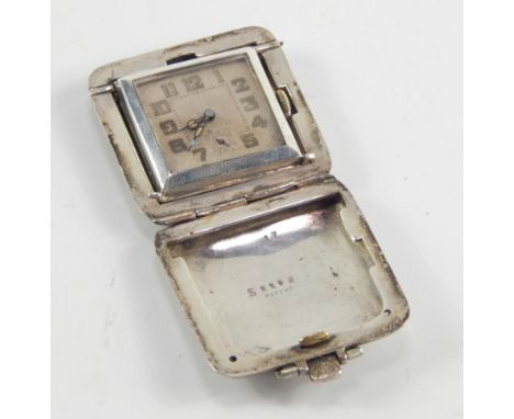 A George V silver cased pendant watch, square dial bearing Arabic numerals, subsidiary seconds dial, engine turned case, inte