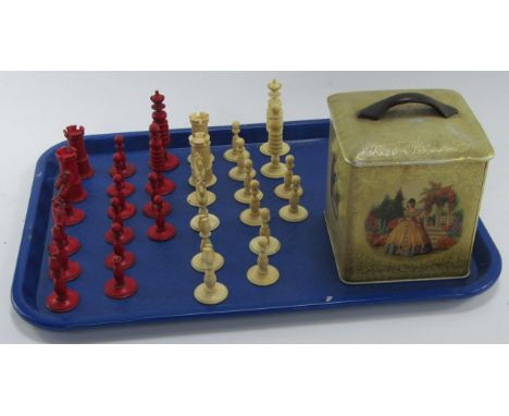 A 19thC Anglo Indian ivory chess set, white and red stained, Queen, 8.5cm high, King, 8cm high.