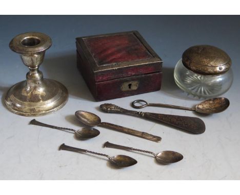 A Loaded Silver Candlestick, silver top dressing table pot, teaspoons and silver mounted box, 53g weighable silver. A/F 