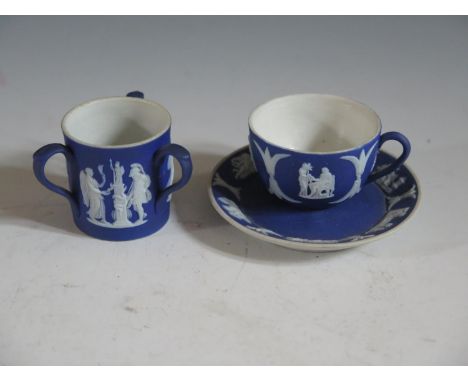 A Wedgwood Blue Jasper Miniature Teacup with saucer (68mm) and loving cup (rim chip) 