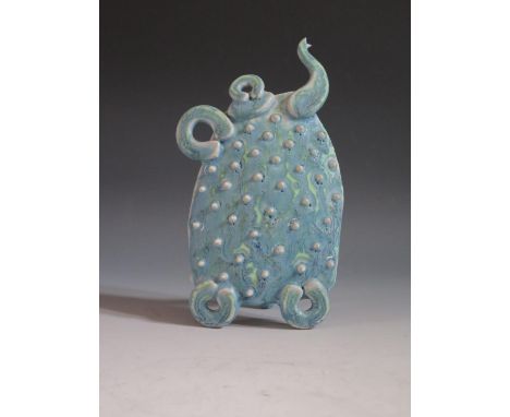 Peter Beard, A Stoneware Ceramic Plaque of a Teapot with relief spot pattern having a blue / green glaze, easel back and impr
