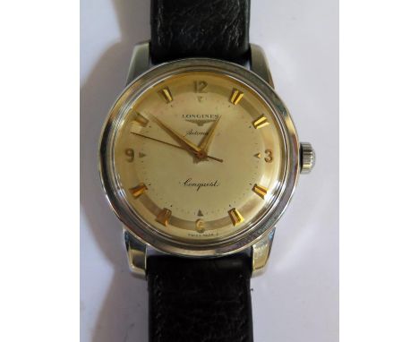 A Longines Conquest Heritage Gent's Wristwatch, model L1.611.4.752, with gold dial, 35mm case, running. Dial with defects and