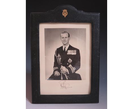 A Prince Philip Autographed Black and White Photographic Half Length Portrait wearing Royal Navy Uniform and in original leat