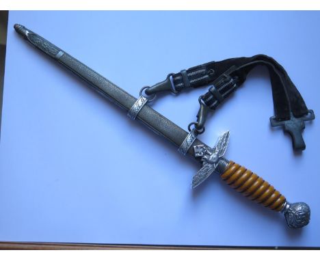 A German WWII Luftwaffe Dagger by Horster with hanging straps, dents to scabbard 