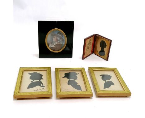 Leather framed silhouette of a lady with gold overpainted highlights with a mounted crest (John James Lecky), watercolour por
