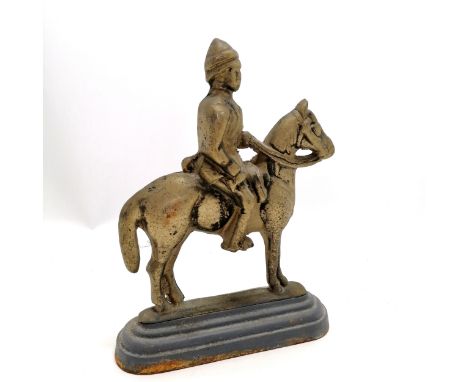 Vintage cast metal doorstop in the form of a military man on a horse - 25cm high 