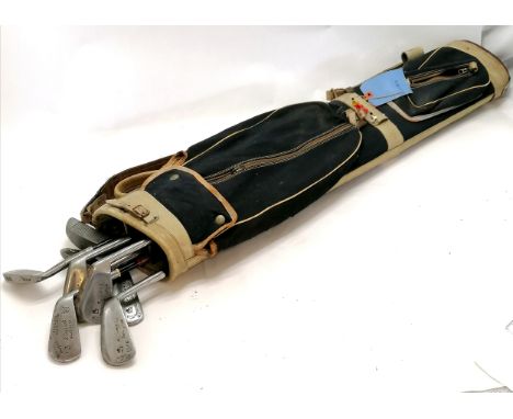 Vintage golf clubs in leather and canvas golf bag including 4 x Rustless by Ernest F Sales