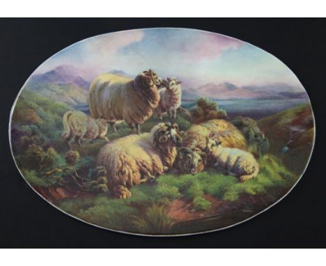 A large fine Minton porcelain oval plaque, painted with a study of sheep in a Scottish Highland setting, signed, 35cm