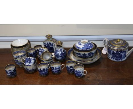 A Chinese export blue and white forty one piece tea set, Qianlong period, each piece painted with pavilions in a river landsc