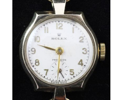 A lady's late 1940's 9ct gold Rolex Precision manual wind wrist watch, with circular Arabic dial and subsidiary seconds, on a