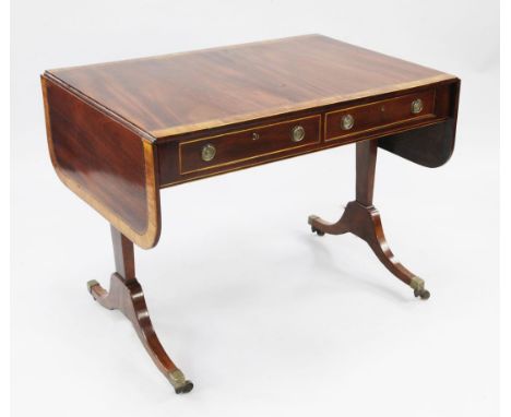 A George III mahogany sofa table, the top with satinwood crossbanding and inlaid geometric border, with two drawers opposing 