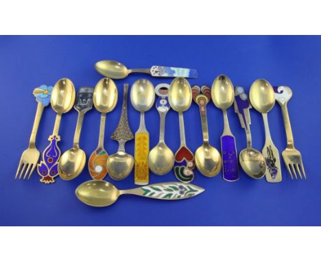 Thirteen Danish sterling silver gilt and enamel Christmas spoons and two forks, all designed by Anton Michelsen, gross 22.5 o