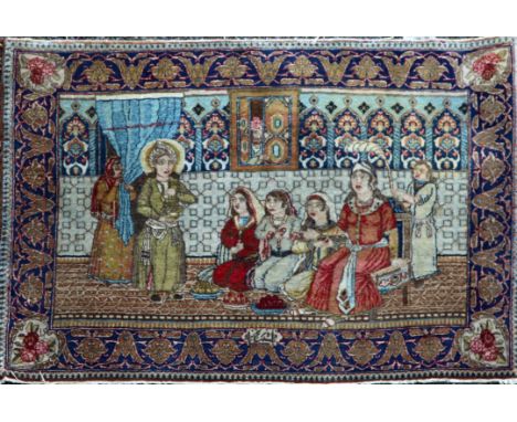 A small Persian pictorial rug, depicting a ceremonial scene, with geometric foliate border, 3ft 3in by 2ft 3in.
