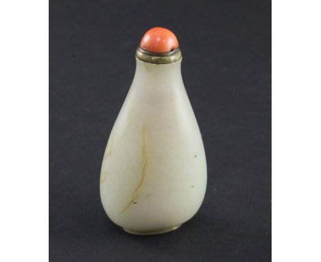 A Chinese pale celadon jade pear shaped snuff bottle, 1750-1850, the stone of good even tone with some russet veining, 6cm, b