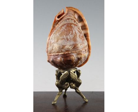 An Italian conch shell cameo table lamp, decorated with a classical scene depicting Aphrodite with her chariot and doves, on 