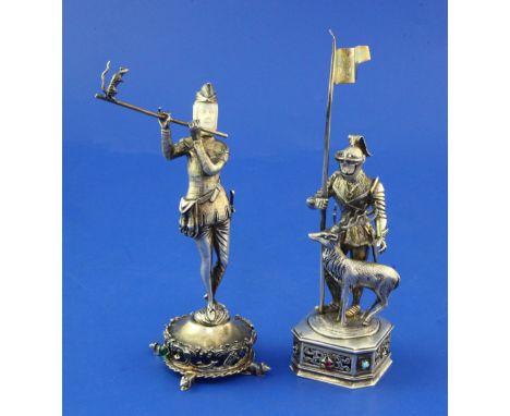 Two early 20th century German sterling silver, ivory and cabochon set miniature figures, The Pied Piper of Hamelin & St. Eust