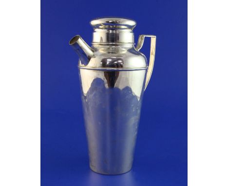 A 1930's American Art Deco sterling silver cocktail shaker by Samuel Kirk & Sons, with engraved inscription, lacking spout ca