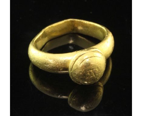 An antique Byzantine style high carat gold ring, weight 24 grams.