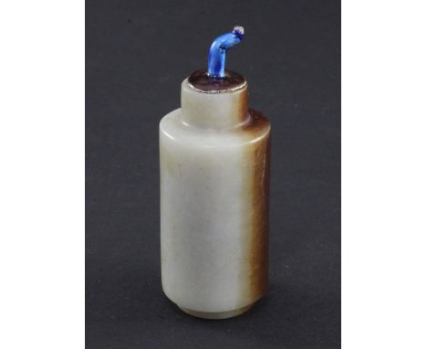 A Chinese pale grey and brown jade cylindrical snuff bottle, 1800-1900, the carver skillfully using the brown inclusion to on